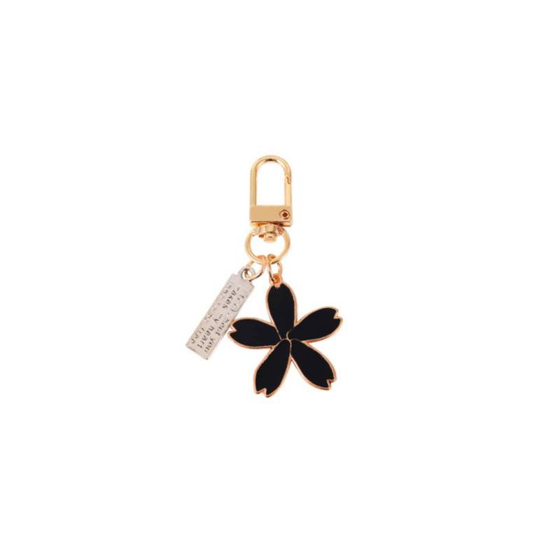 COLORFUL BLING 1-4PCS Blume Charms Schlüsselanhänger Gänseblümchen Sakura Kette Quaste Emaillierte Schlüsselanhänger Handtasche Geldbörse Zubehör, C-schwarz Sakura (1 Stück), 1 von COLORFUL BLING