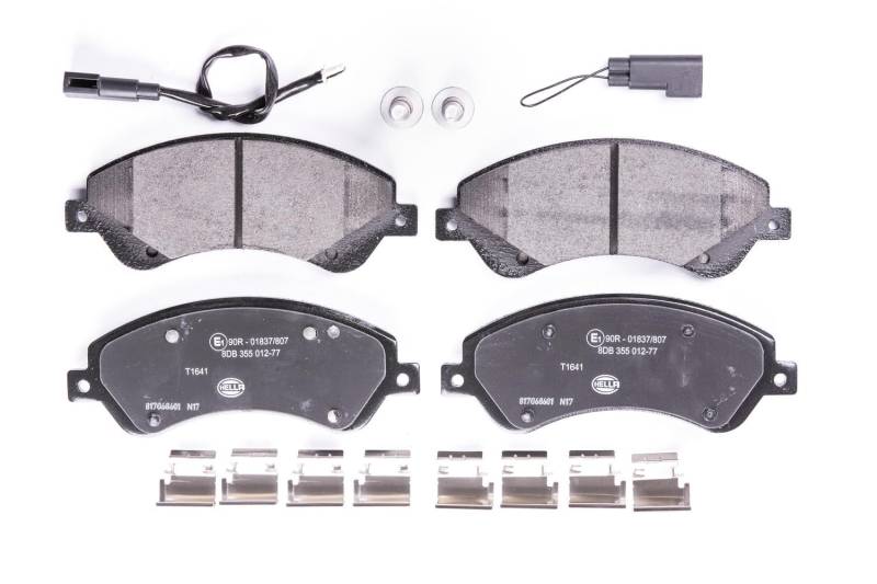 HELLA Bremsbeläge vorne - inkl. Warnkontakt - vier Bremsbeläge pro Set - T1641 - für u.a. FORD - 8DB 355 012-771 von Hella