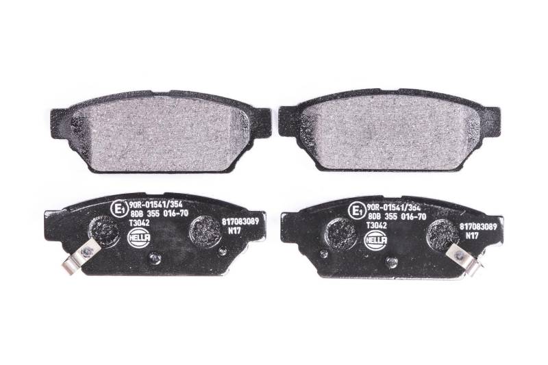 HELLA Bremsbeläge hinten - mit akustischer Verschleißwarnung - vier Bremsbeläge pro Set - T3042 - für u.a. MITSUBISHI / PROTON - 8DB 355 016-701 von Hella