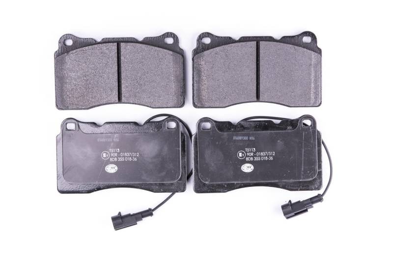 HELLA Bremsbeläge vorne - mit Warnkontakt - vier Bremsbeläge pro Set - T5113 - für u.a. ALFA ROMEO / LANCIA / VOLVO - 8DB 355 018-361 von Hella