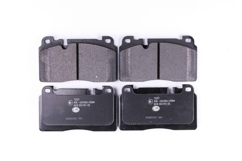HELLA Bremsbeläge vorne - für Verschleißwarnanzeiger vorbereitet - vier Bremsbeläge pro Set - T2321 - für u.a. AUDI - 8DB 355 021-331 von Hella