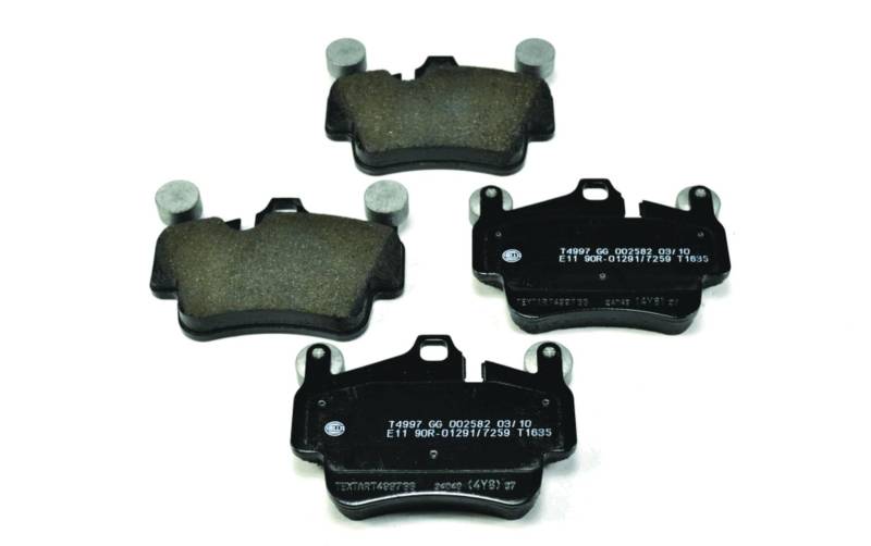 HELLA Bremsbeläge vorne - für Verschleißwarnanzeiger vorbereitet - vier Bremsbeläge pro Set - T1635 - für u.a. PORSCHE - 8DB 355 012-721 von Hella