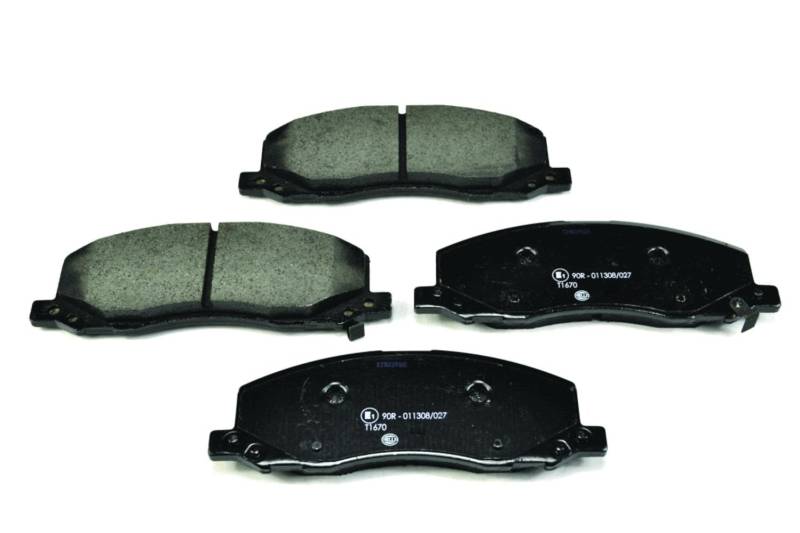 HELLA Bremsbeläge vorne - mit akustischer Verschleißwarnung - vier Bremsbeläge pro Set - T1670 - für u.a. OPEL / SAAB / VAUXHALL - 8DB 355 013-061 von Hella