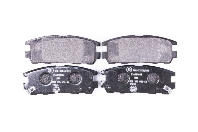 HELLA Bremsbeläge hinten - mit akustischer Verschleißwarnung - vier Bremsbeläge pro Set - T3034 - für u.a. ACURA / CHEVROLET / HOLDEN / HONDA - 8DB 355 016-621 von Hella