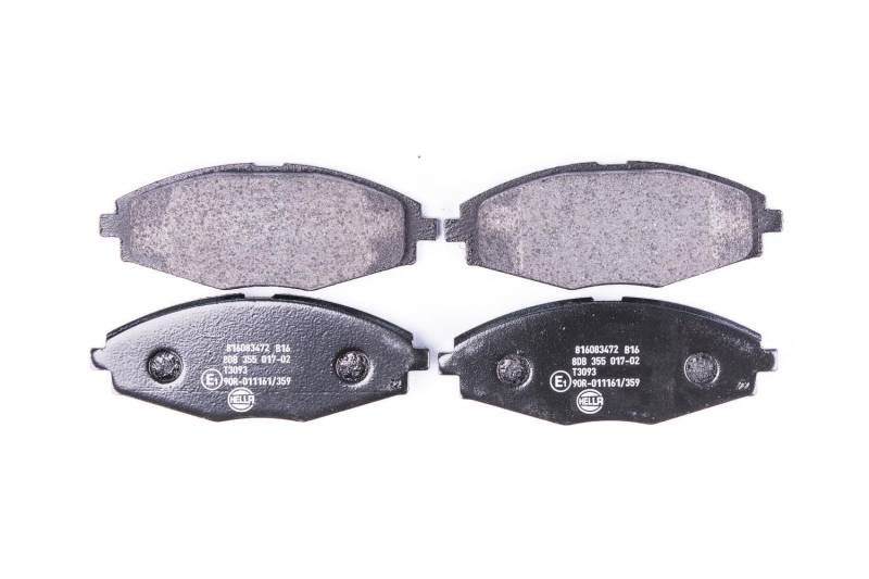 HELLA Bremsbeläge vorne - nicht für Verschleißwarnanzeiger vorbereitet - vier Bremsbeläge pro Set - T3093 - für u.a. CHERY / CHEVROLET / DAEWOO / PONTIAC - 8DB 355 017-021 von Hella