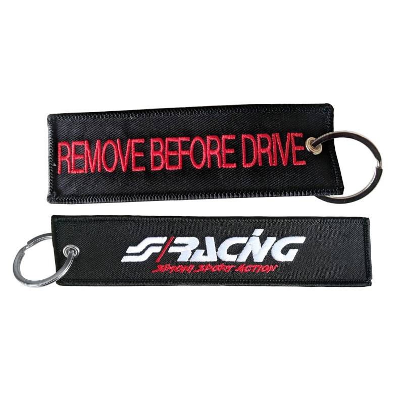 Simoni Racing SRK9 Schlüsselanhänger in Schwarzem Stoff Remove Before Drive, Schwarz von Simoni Racing